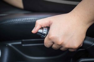 Battery-Services-Marshall-Batteries-holds-handbrake